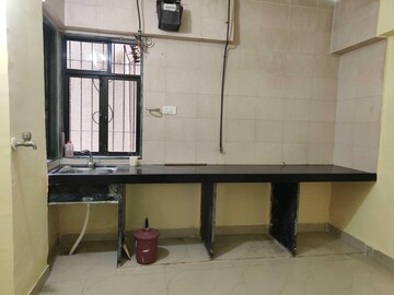 Kitchen in 2 BHK Apartment at Azad Nagar Sangam CHS Andheri, Andheri West – for Rent