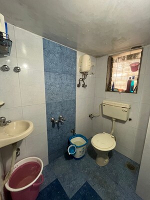 Bathroom in 2 BHK Apartment at Mahadev Plaza, Bhayandar East – for Sale