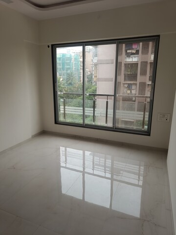 Room in 1 BHK Apartment at Nilayam CHS, Kandivali West – for Sale