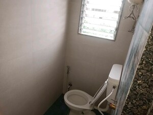 Bathroom in 2 BHK Apartment at Manishdeep CHS, Andheri West – for Rent
