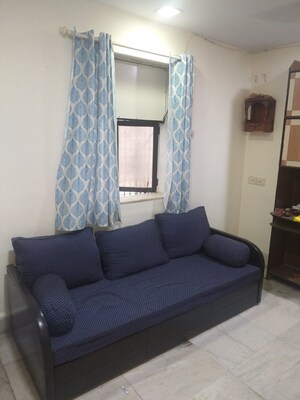 Living Room in 2 BHK Apartment at MIG Colony, Worli – for Rent