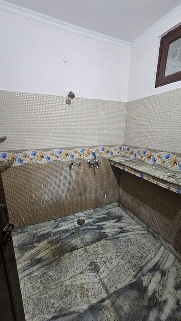 Bedroom in 2 BHK Builder Floor at Ansal Palam Triangle, Palam Vihar Extension – for Rent