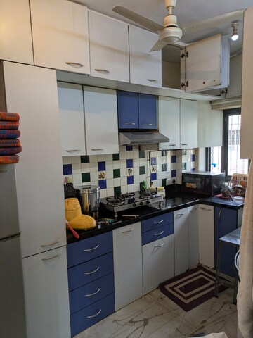Kitchen in 2 BHK Apartment at Oshiwara Mhada, Andheri West – for Rent