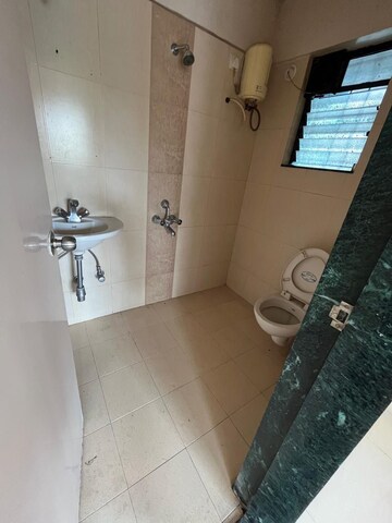 Bathroom in 3 BHK Apartment at Potnis Parisar, Karve Nagar – for Rent