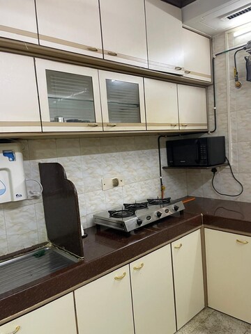 Kitchen in 2 BHK Apartment at Oshiwara Mhada, Andheri West – for Rent