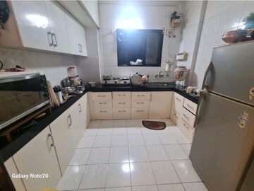 Kitchen in 2 BHK Apartment at Karishma Society, Kothrud – for Rent