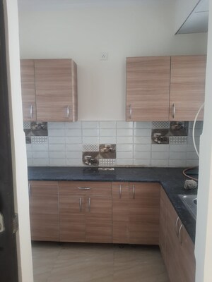 Kitchen in 2 BHK Apartment at Gaur City 2 - 14th Avenue, Sector 16c Greater Noida – for Rent