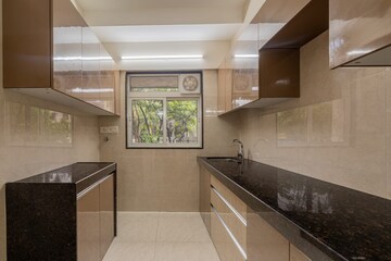 Kitchen in 1 BHK Apartment at Veena Senterio, Chembur – for Sale