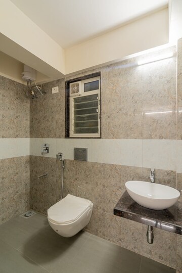 Bathroom in 1 BHK Apartment at Veena Senterio, Chembur – for Sale