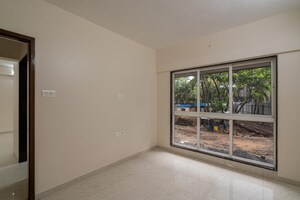 Living Room in 1 BHK Apartment at Veena Senterio, Chembur – for Sale