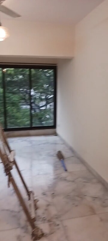 Room in 1 BHK Apartment at Woodland Apartment, Andheri West – for Rent