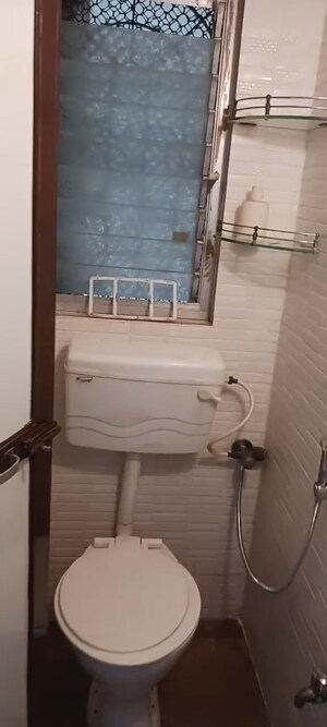 Bathroom in 1 BHK Apartment at Woodland Apartment, Andheri West – for Rent