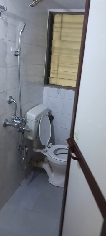 Bathroom in 1 BHK Apartment at Woodland Apartment, Andheri West – for Rent