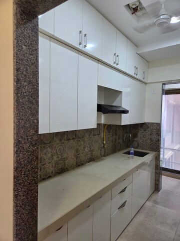 Kitchen in 2 BHK Apartment at Suvasya Swastik Onyx, Tagore Nagar – for Rent
