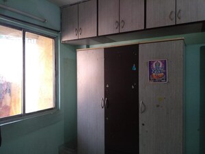 Bedroom in 2 BHK Apartment at Fam CHS, Kopar Khairane – for Rent