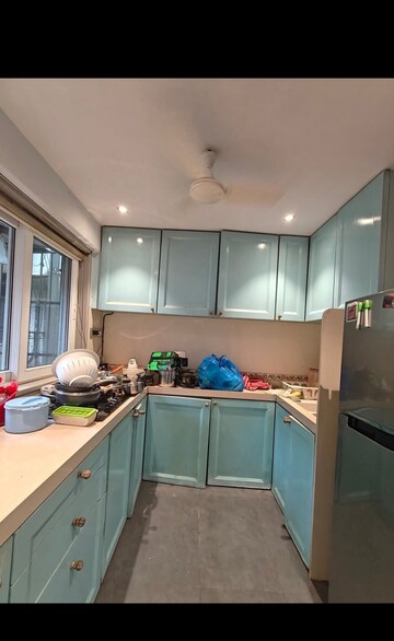 Kitchen in 2 BHK Apartment at Trishul CHS, Andheri West – for Rent