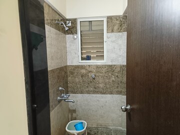 Bathroom in 1 BHK Apartment at Ishwar Parmar River Residency, Chikhali – for Rent