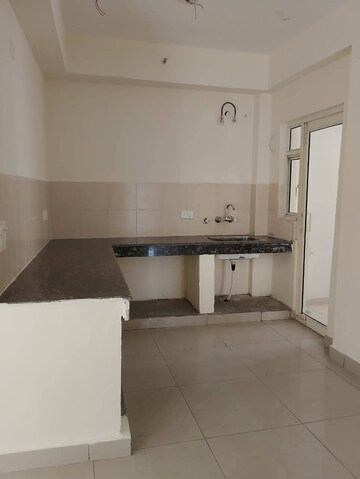 Kitchen in 2 BHK Apartment at Amrapali Centurian Park Phase II, Tech Zone 4 Greater Noida – for Rent