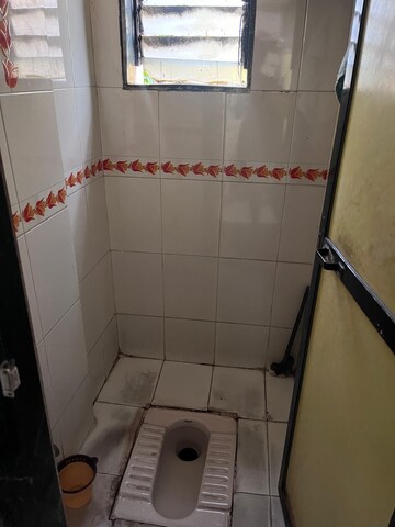 Bathroom in 1 BHK Apartment at Devta CHS, Kharigaon – for Rent