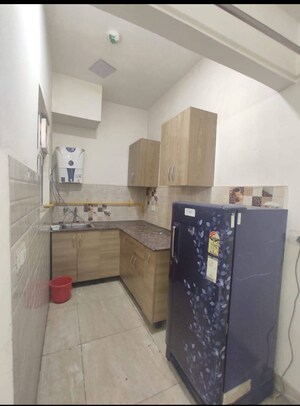 Kitchen in 1.5 BHK Apartment at Gaur City 2 - 14th Avenue, Sector 16c Greater Noida – for Rent