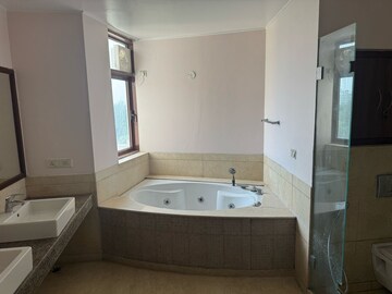 Bathroom in 4 BHK Apartment at Jaypee Green Earth Court, Jaypee Greens – for Rent