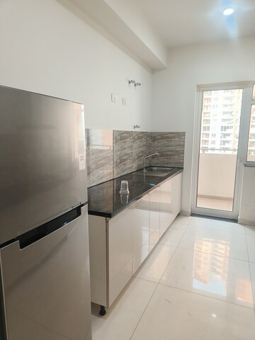 Kitchen in 4 BHK Apartment at Shapoorji Pallonji Joyville Phase 2, Sector 102 – for Rent
