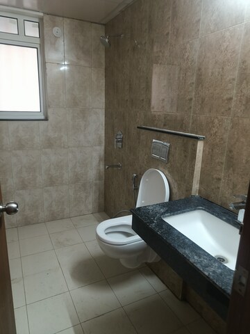 Bathroom in 4 BHK Apartment at Shapoorji Pallonji Joyville Phase 2, Sector 102 – for Rent