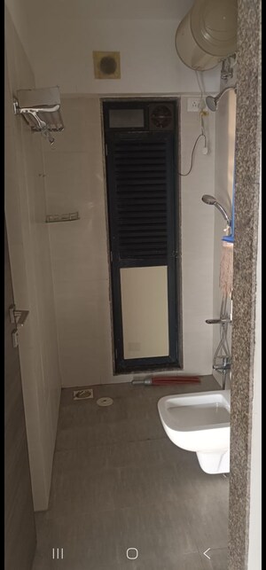 Bathroom in 2 BHK Apartment at Kanakia Rainforest, Andheri East – for Rent