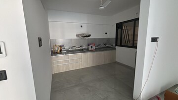 Kitchen in 1 BHK Apartment at Unique Youtopia, Kharadi – for Rent