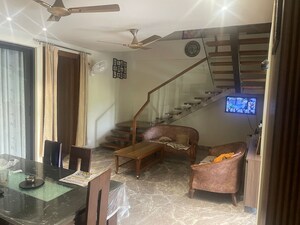Living Room in 3 BHK Apartment at Tata Raheja Raisina Residency, Sector 59 – for Sale