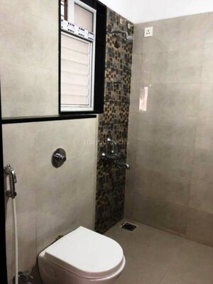 Bathroom in 1 BHK Apartment at Rohan Prarthana, Kothrud – for Rent
