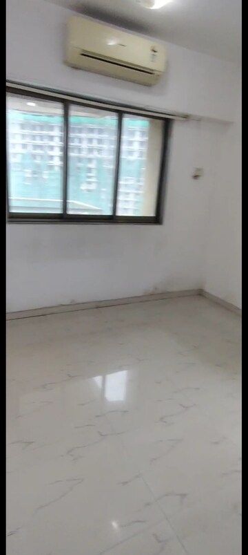 Room in 2 BHK Apartment at Lokhandwala Harmony, Worli – for Rent