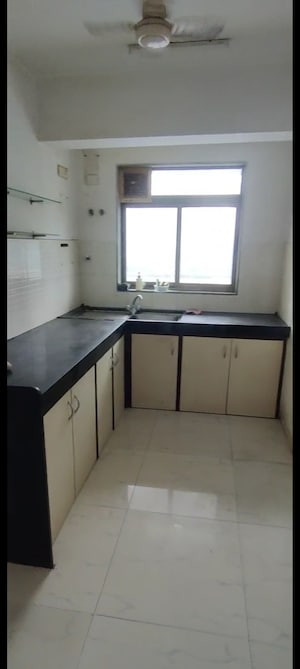 Kitchen in 2 BHK Apartment at Lokhandwala Harmony, Worli – for Rent
