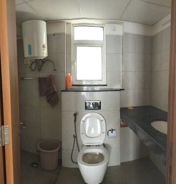 Bathroom in 2.5 BHK Apartment at Arun Vihar, Sector 29 – for Rent