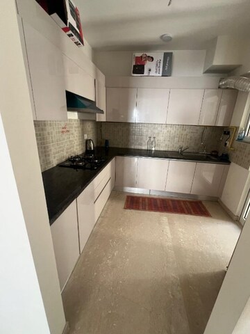 Kitchen in 2.5 BHK Apartment at Arun Vihar, Sector 29 – for Rent