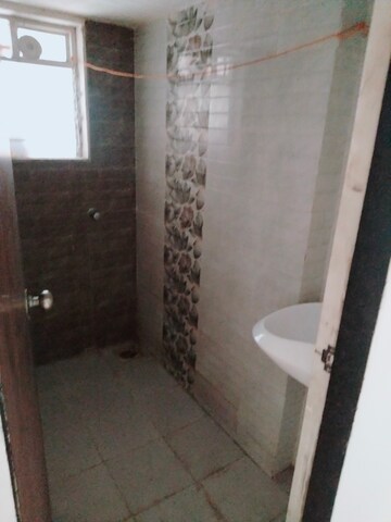 Bathroom in 1 BHK Apartment at Sahakar Residency, Naigaon East – for Rent