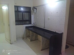 Kitchen in 2 BHK Apartment at Belvalkar Kalpak CHS, Dahanukar Colony – for Rent