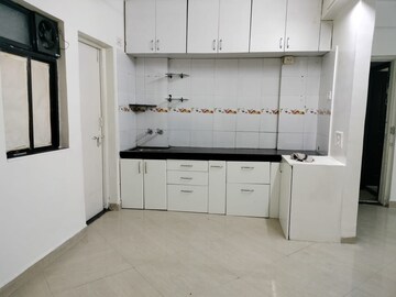 Kitchen in 2 BHK Apartment at Mittal Atria, Dhanori – for Rent
