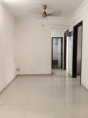 Living Room in 1 BHK Apartment at Nisarg Hyde Park, Kharghar – for Sale