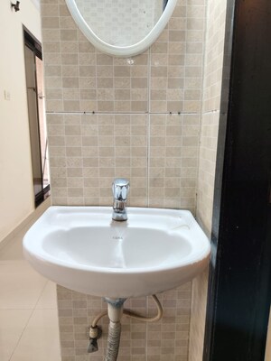 Bathroom in 1 BHK Apartment at Nisarg Hyde Park, Kharghar – for Sale