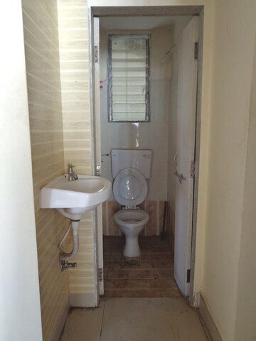 Bathroom in 1 BHK Apartment at Twins Hallmark, Kopar Khairane – for Rent