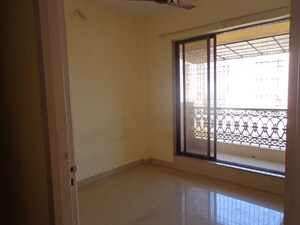 Bedroom in 1 BHK Apartment at Twins Hallmark, Kopar Khairane – for Rent