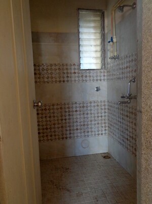 Bathroom in 1 BHK Apartment at Twins Hallmark, Kopar Khairane – for Rent