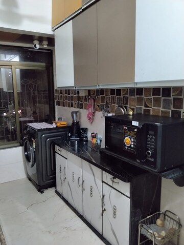 Kitchen in 2 BHK Apartment at Sanpada – for Sale