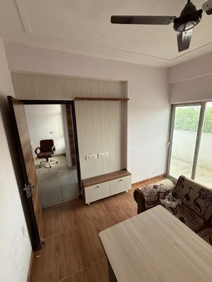 Living Room in 1 BHK Apartment at Sector 16b – for Sale