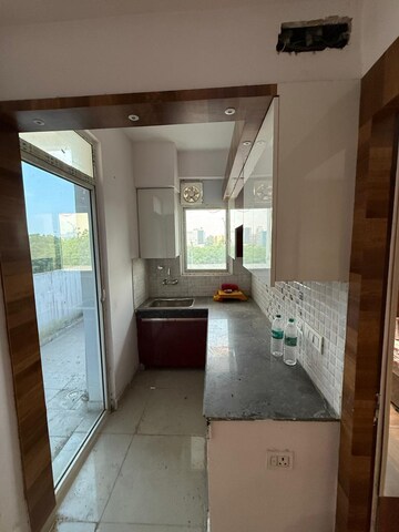 Kitchen in 1 BHK Apartment at Sector 16b – for Sale