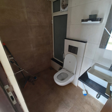 Bathroom in 1 BHK Apartment at Omkar Signet, Malad East – for Rent
