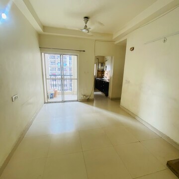 Living Room in 2 BHK Apartment at Aims Golf Avenue II, Sector 75 – for Rent