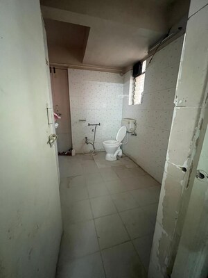 Bathroom in 2 BHK Apartment at Planet Millennium CHS, Pimple Saudagar – for Rent