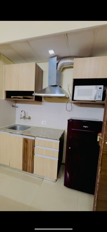 Kitchen in 1 RK Apartment at Supertech Ecociti, Sector 137 – for Rent